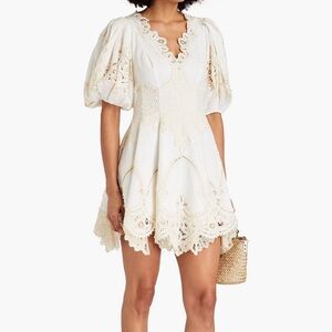 ZIMMERMANN
Crocheted lace-paneled linen mini dress